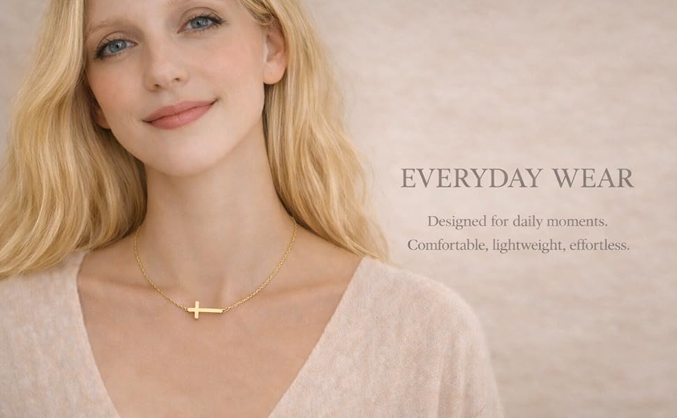 Home Minimalist gold cross necklace close-up